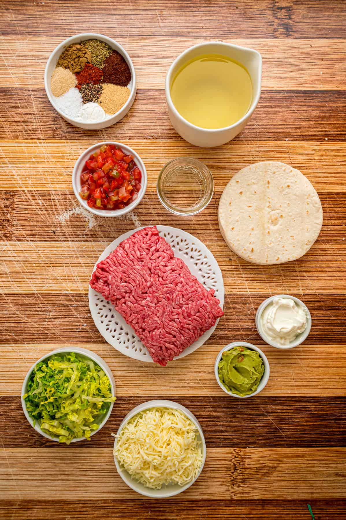 Overhead view of ingredients needed to make ground beef tacos