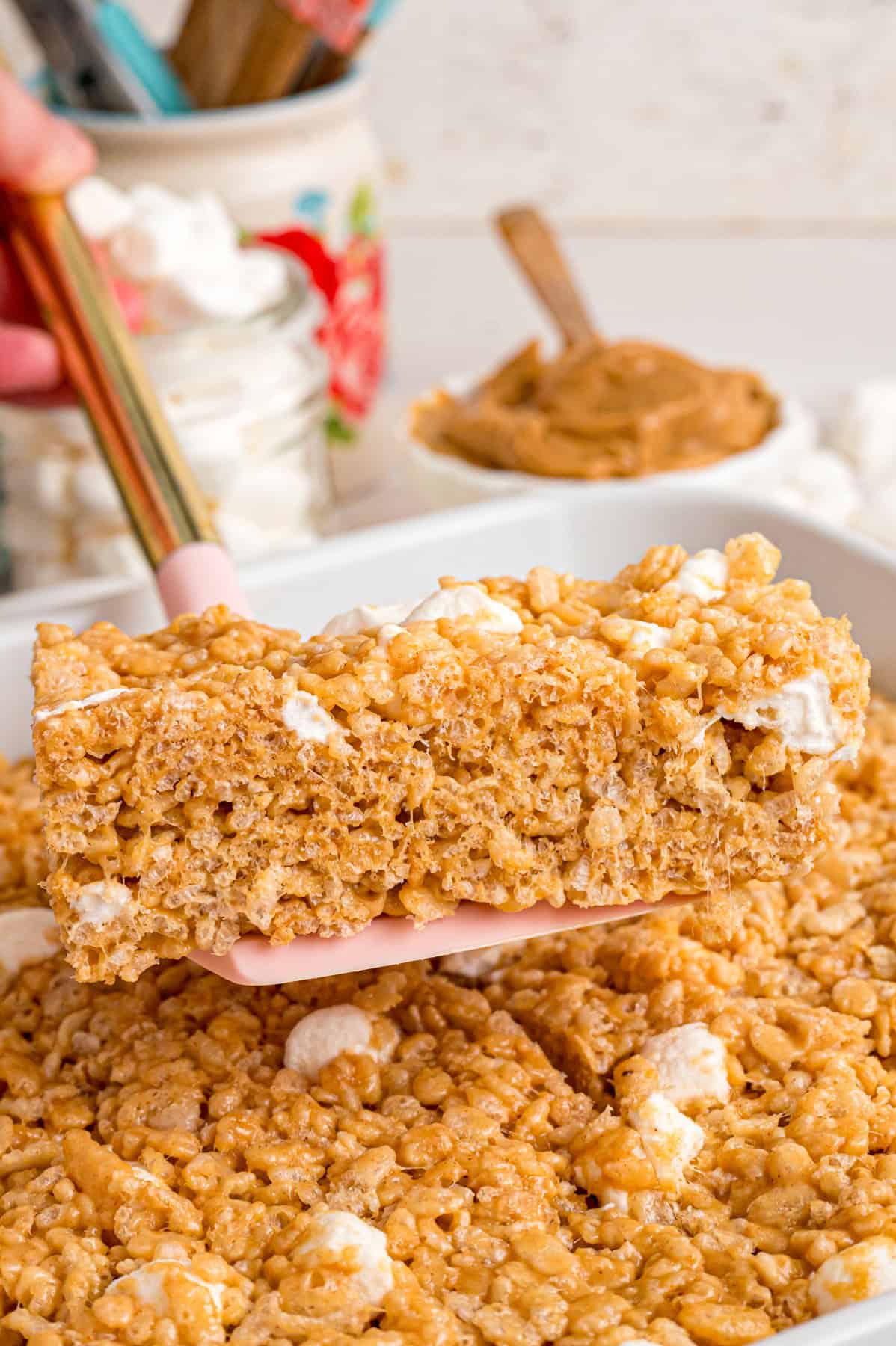 Serving a peanut butter rice krispie treat