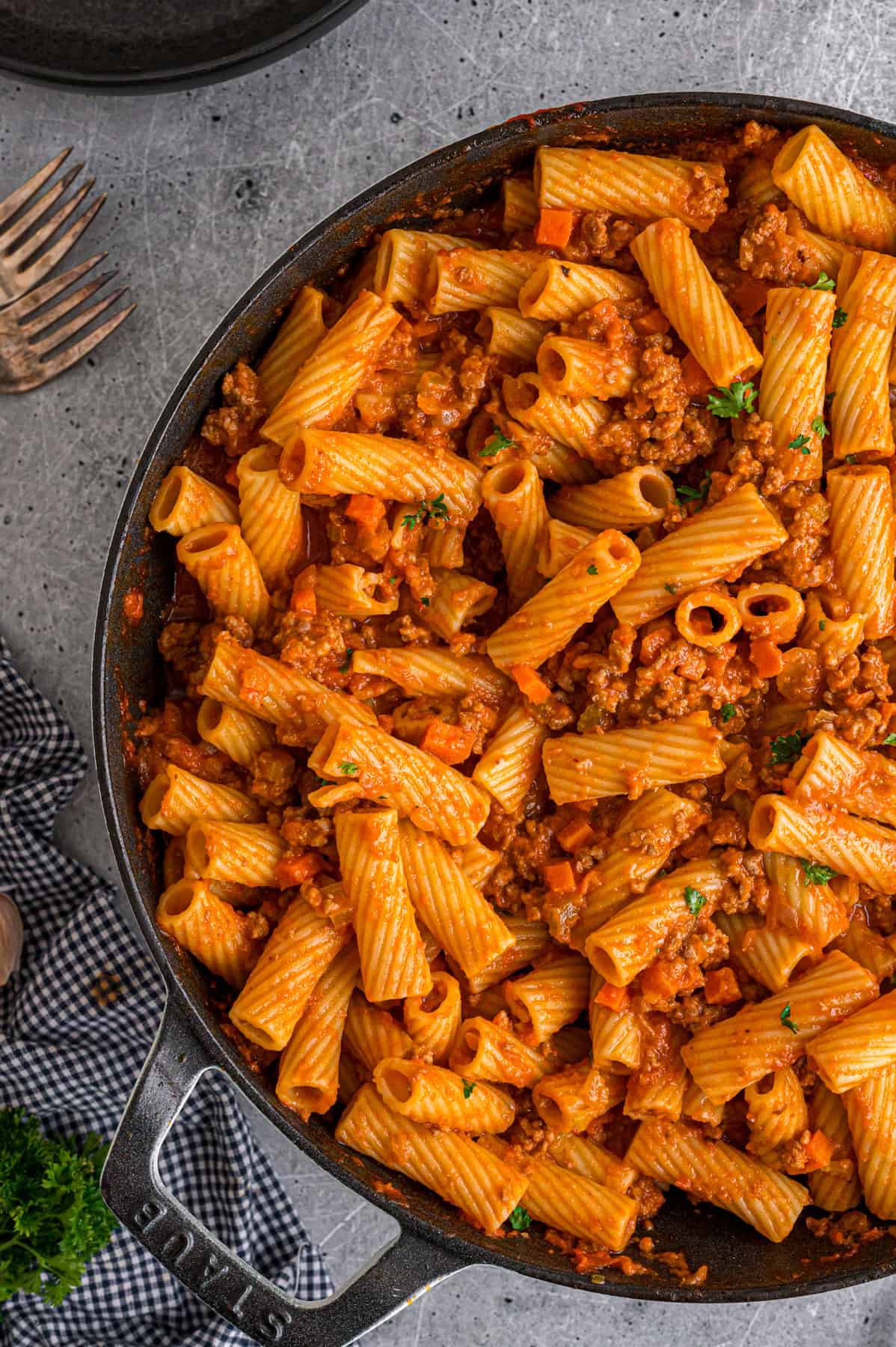 Overhead view of a bowl of rigatoni bolognese