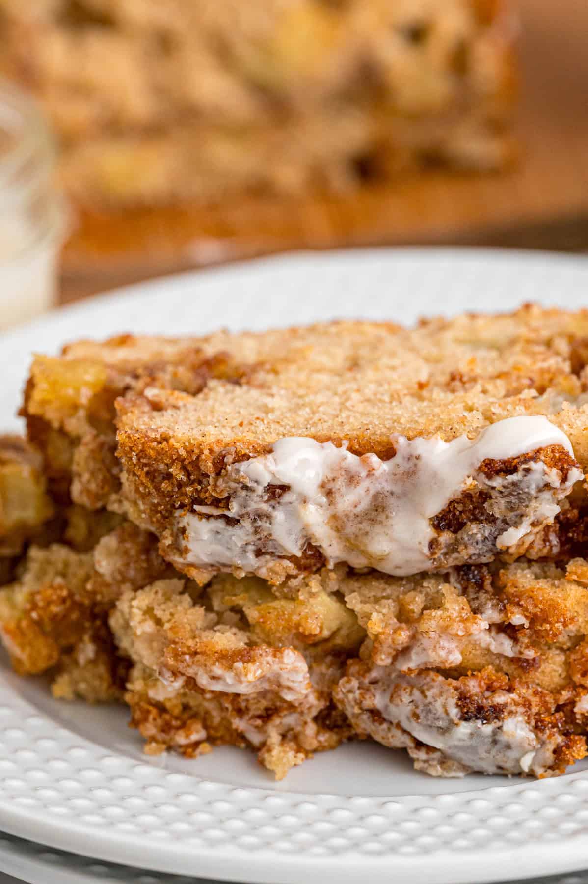 Two slices of apple cinnamon bread on a plate