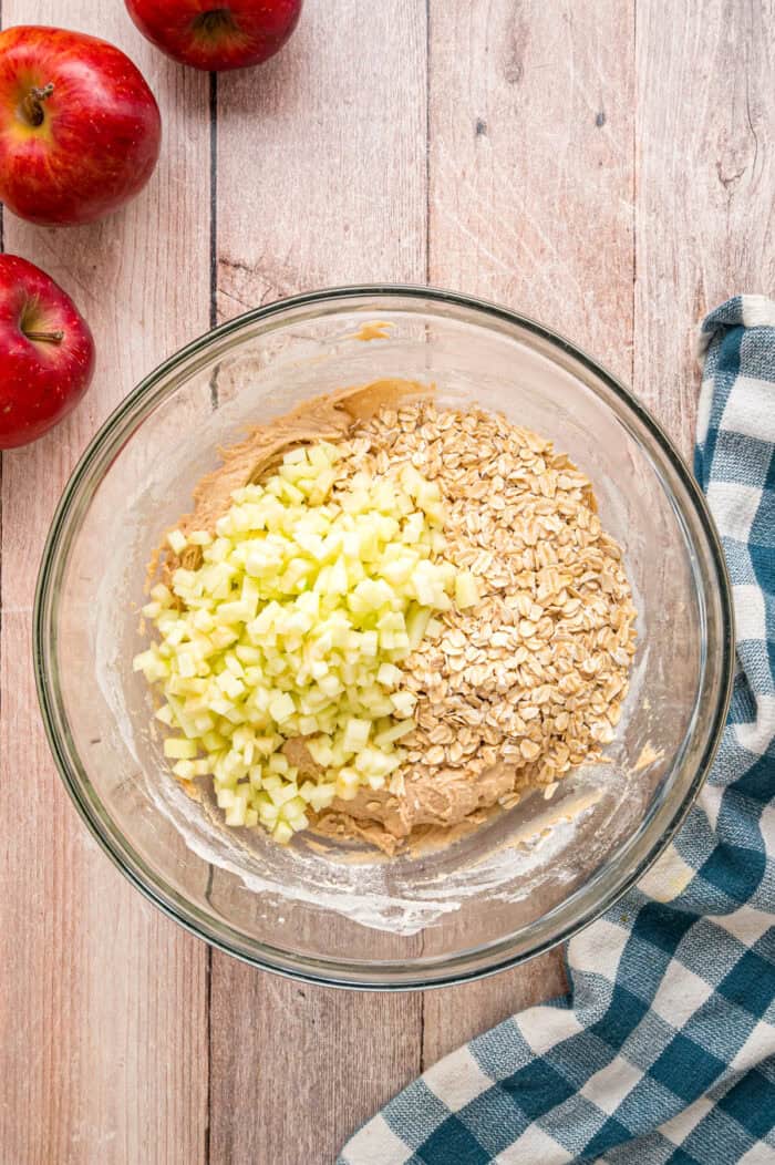Diced apples and oats added to cookie dough