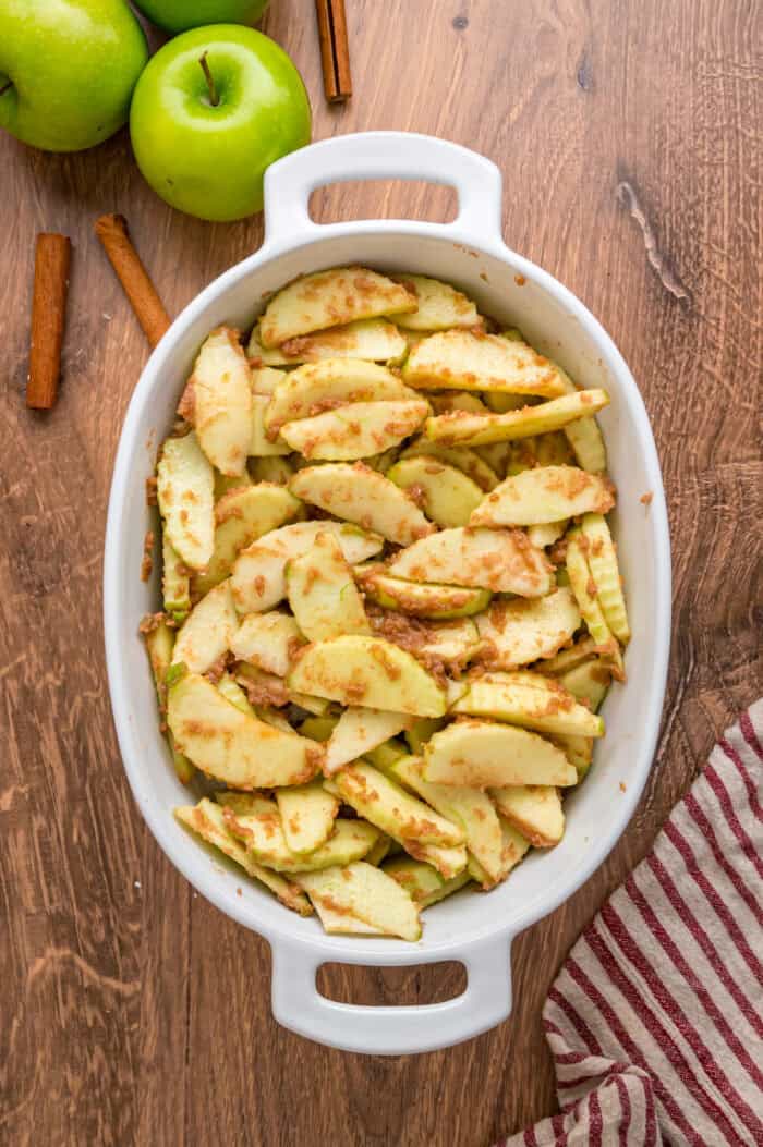 Spiced apple slices in a baking dish