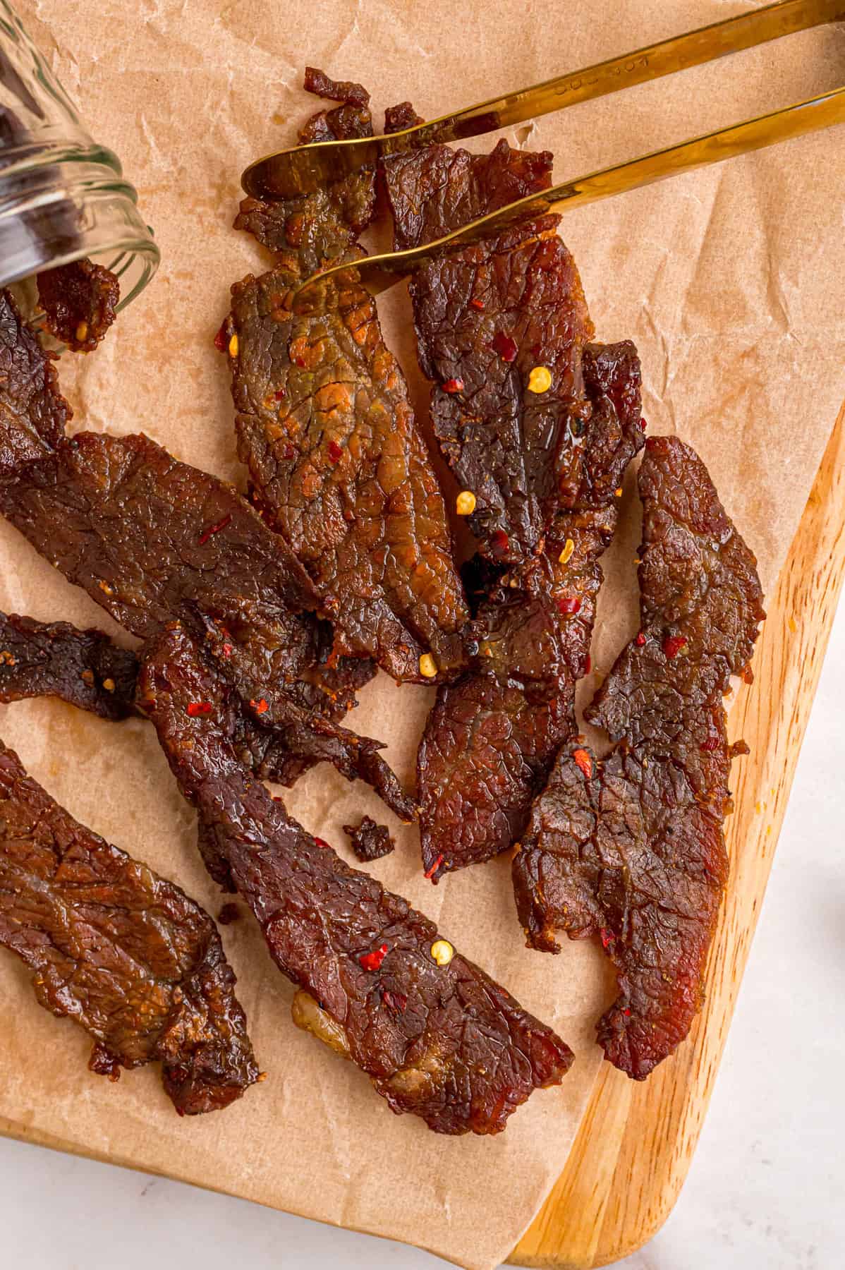 Beef jerky on parchment paper