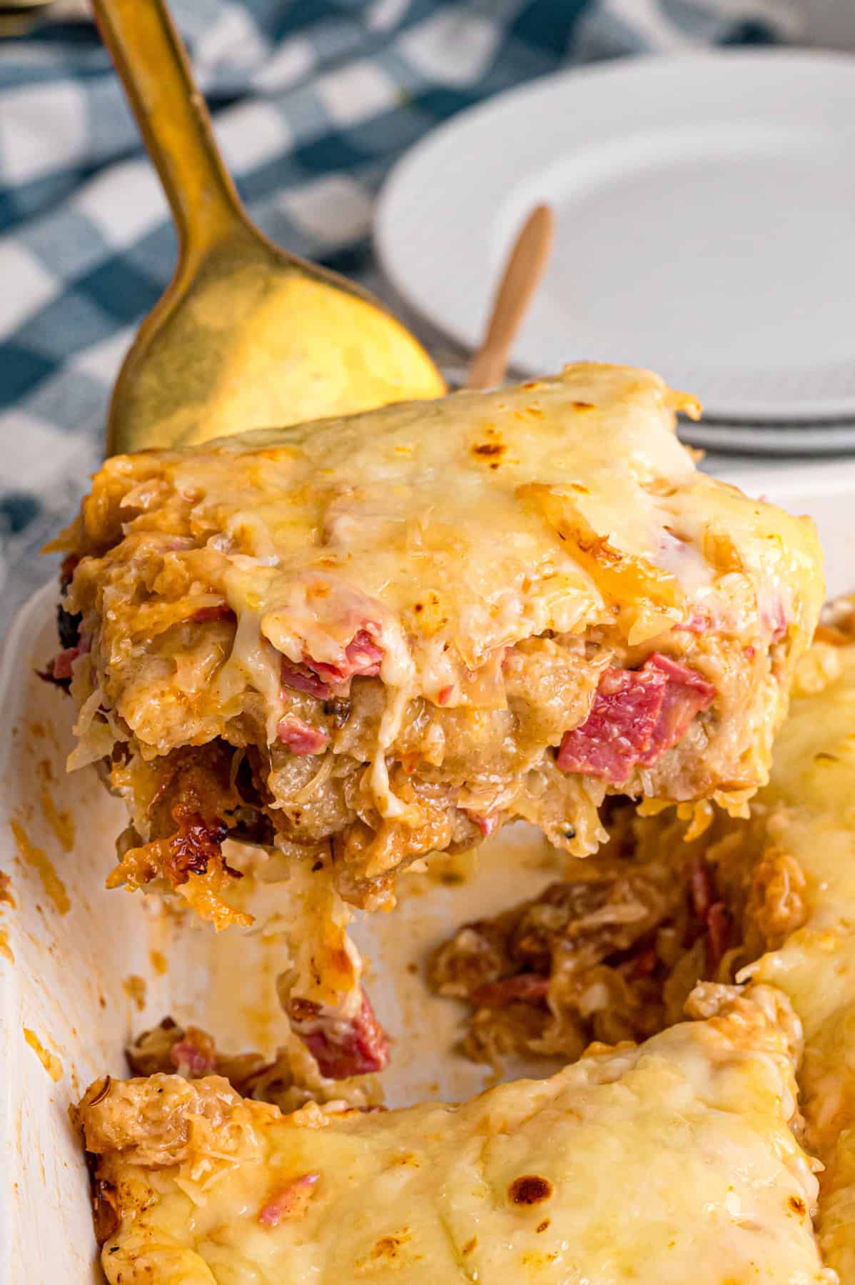 Serving a slice of Reuben casserole