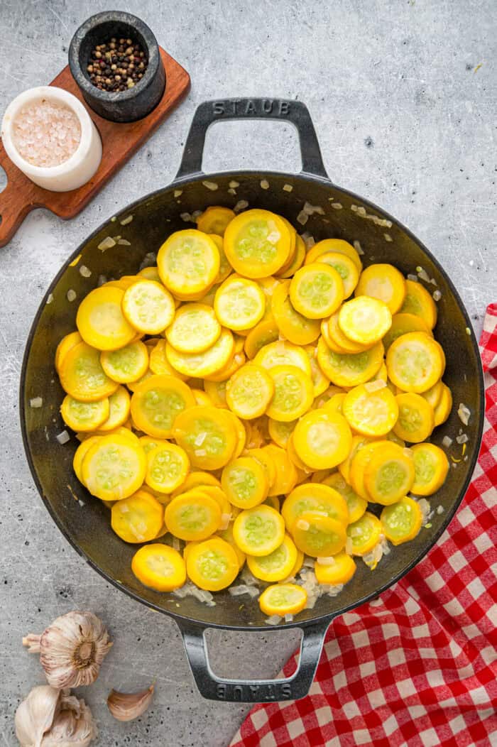 Sauteed yellow squash in a skillet