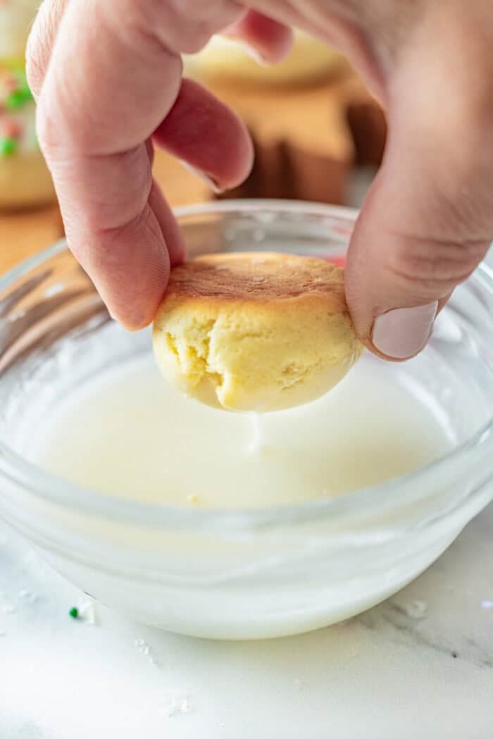 With a soft, buttery texture, the signature anise flavor, and simple decoration, these Anise Cookies are a holiday staple. Dipping a cookie into icing