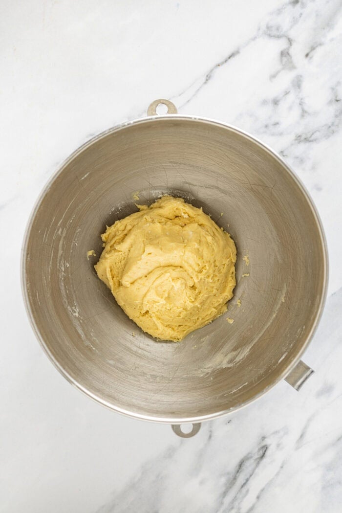 With a soft, buttery texture, the signature anise flavor, and simple decoration, these Anise Cookies are a holiday staple. Cookie dough in a mixing bowl