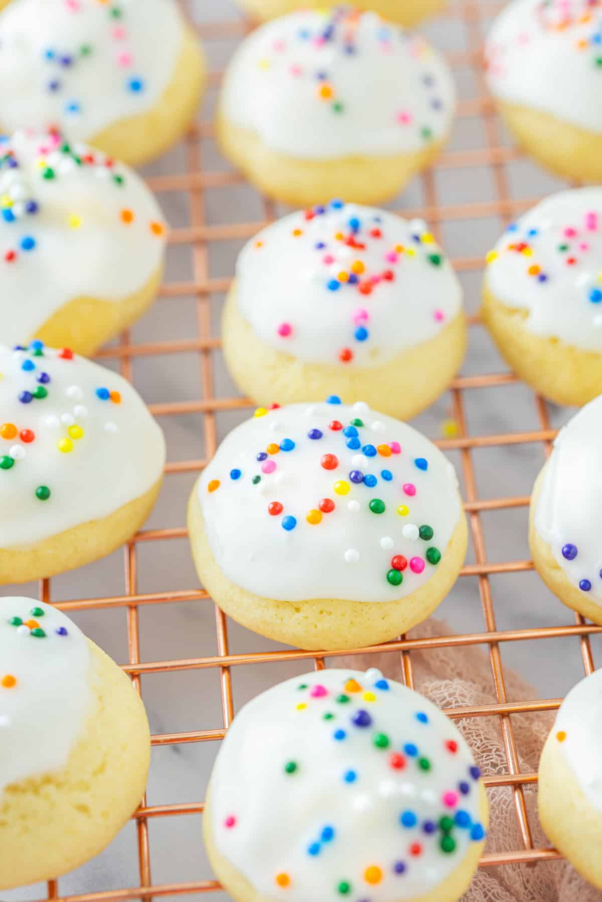 With a soft, buttery texture, the signature anise flavor, and simple decoration, these Anise Cookies are a holiday staple. Anise cookies on a wire rack