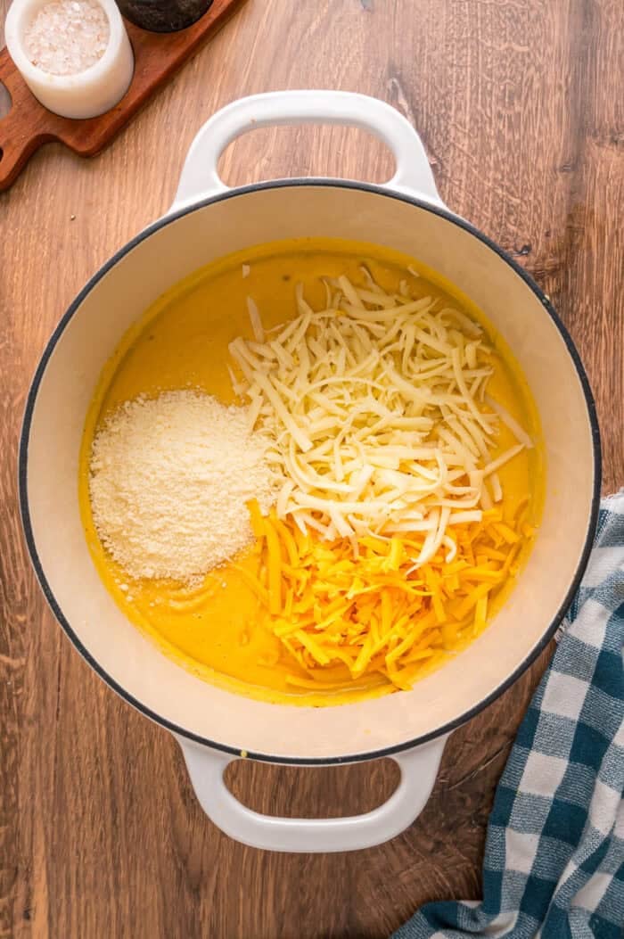 Shredded cheese added to butternut squash puree