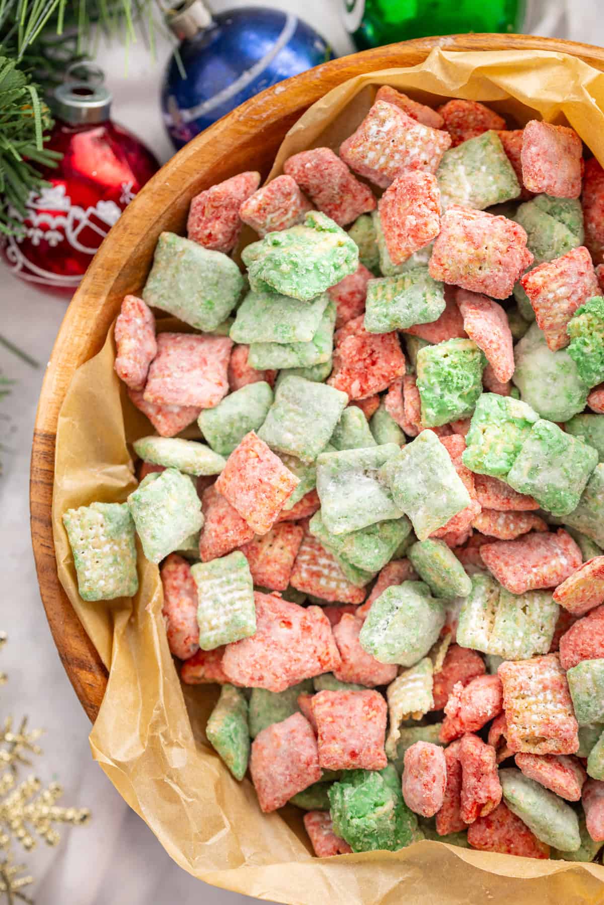 Christmas puppy chow in a wooden bowl
