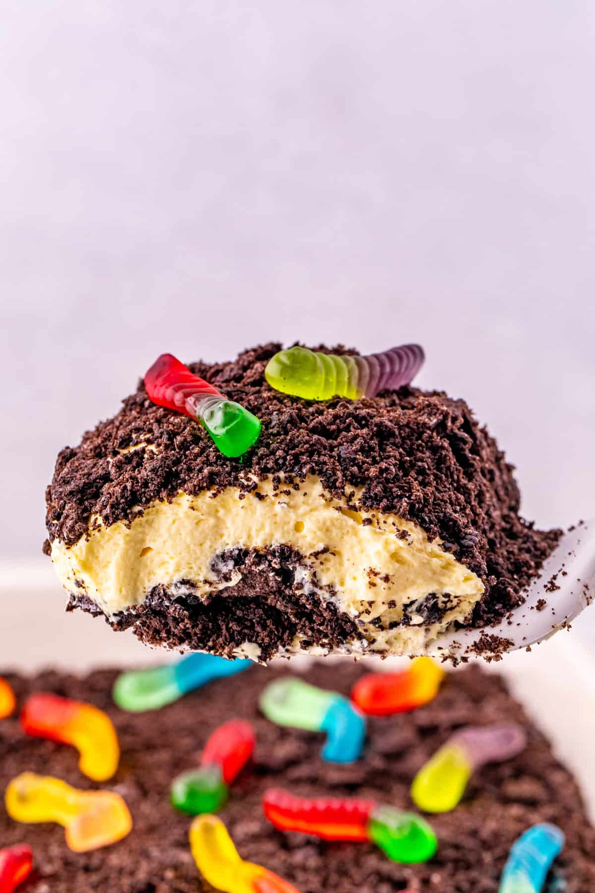 Serving a slice of Oreo dirt cake