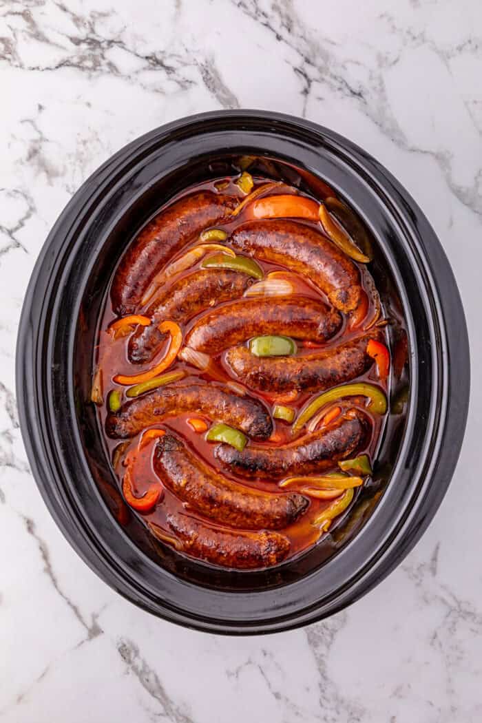 Overhead view of slow cooker sausage and peppers