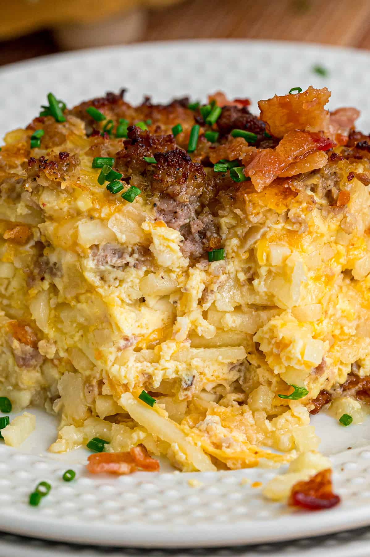 A serving of Amish breakfast casserole on a white plate