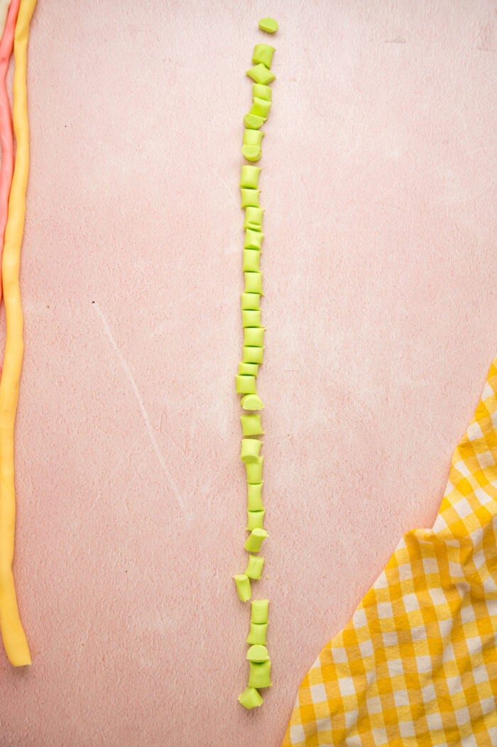 These melt-in-your-mouth Butter Mints are made with just a few ingredients and require no cooking. Easy to customize! A rope of dough cut into 1/2 inch pieces