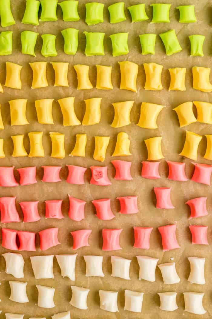 These melt-in-your-mouth Butter Mints are made with just a few ingredients and require no cooking. Easy to customize! Overhead view of butter mints drying on a baking sheet