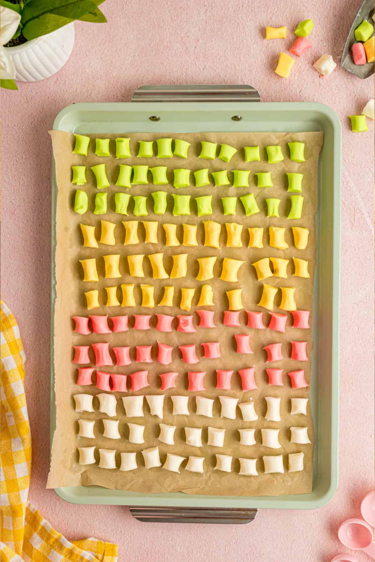 These melt-in-your-mouth Butter Mints are made with just a few ingredients and require no cooking. Easy to customize! Butter Mints on a pan