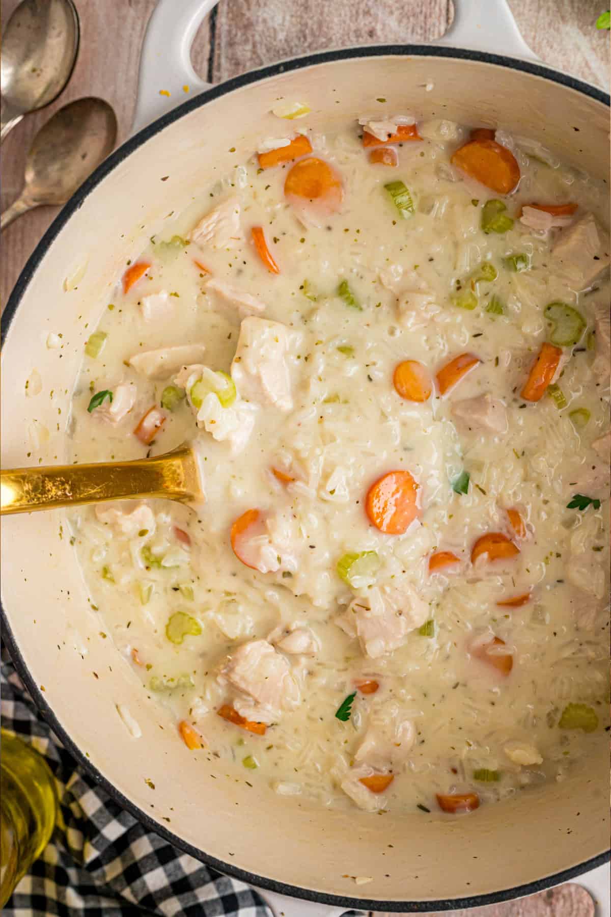 Ready in just under an hour, this Chicken and Rice Soup is quick, easy, and filling. Perfect for busy fall weeknights! Chicken and Rice Soup in a pot