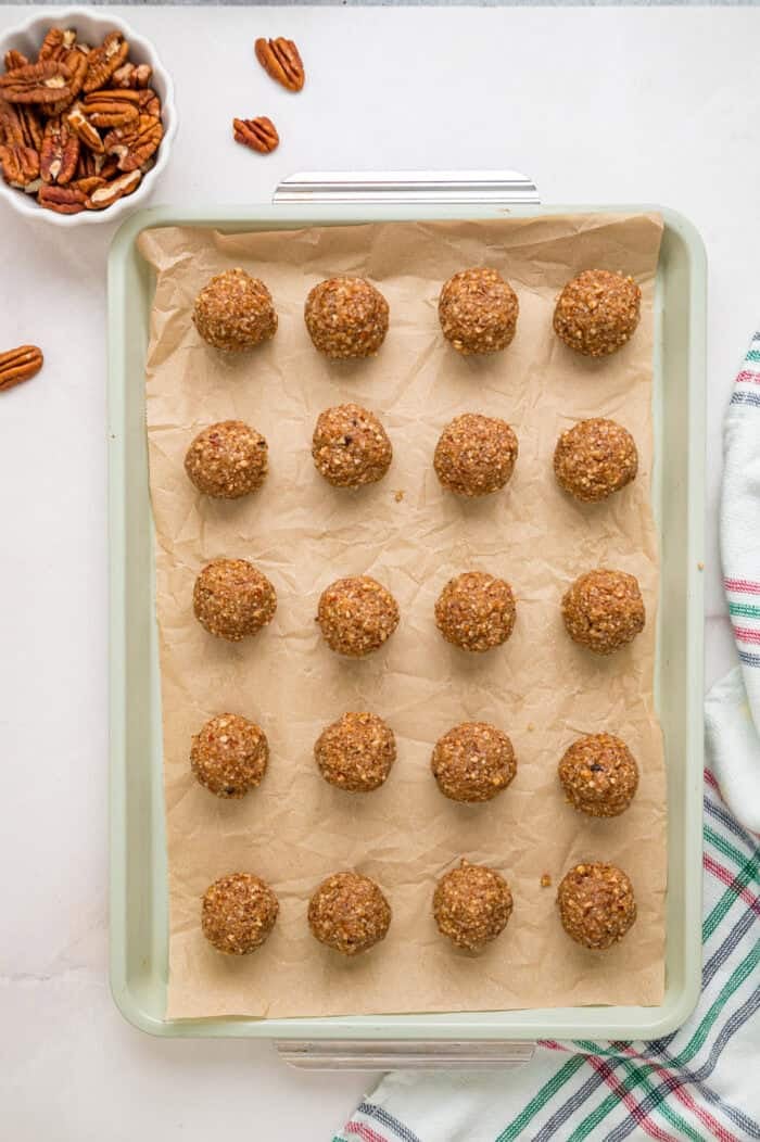 Pecan pie balls on a baking sheet