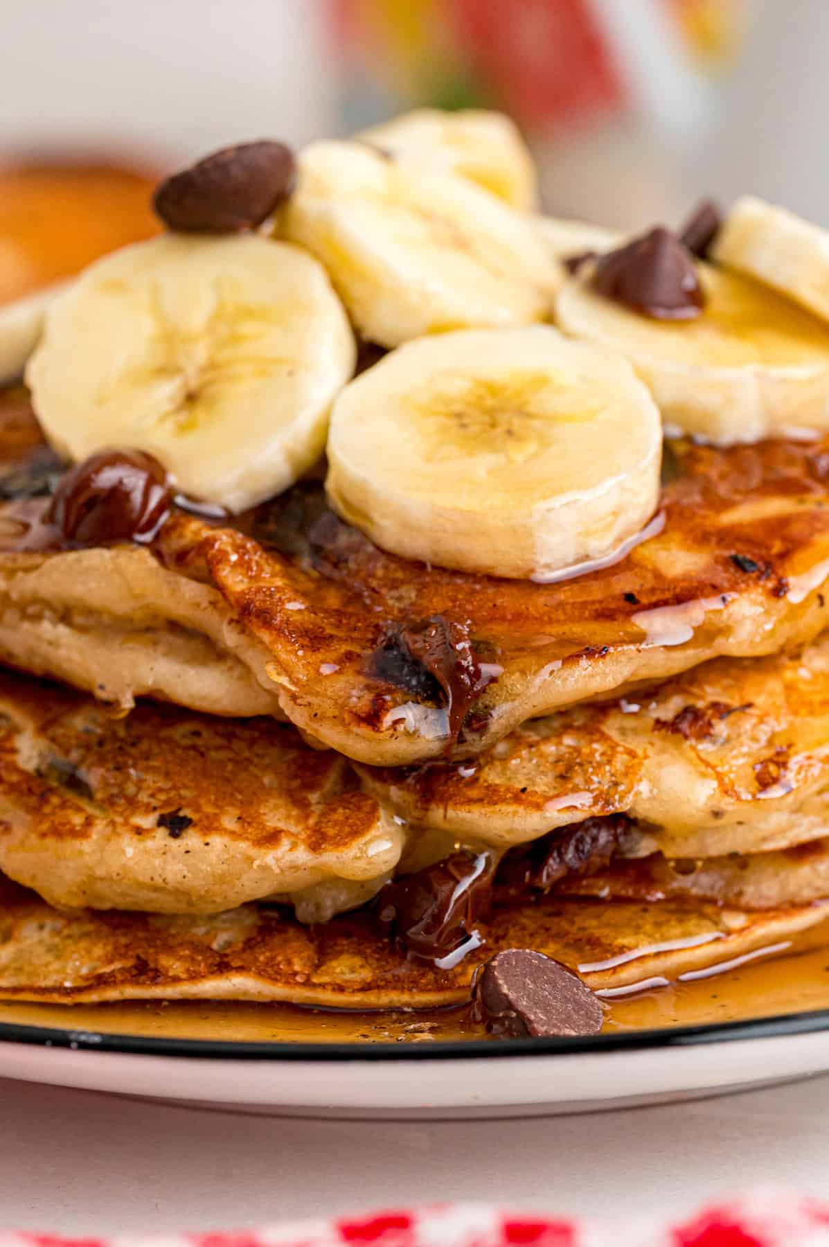 A stack of banana chocolate chip pancakes