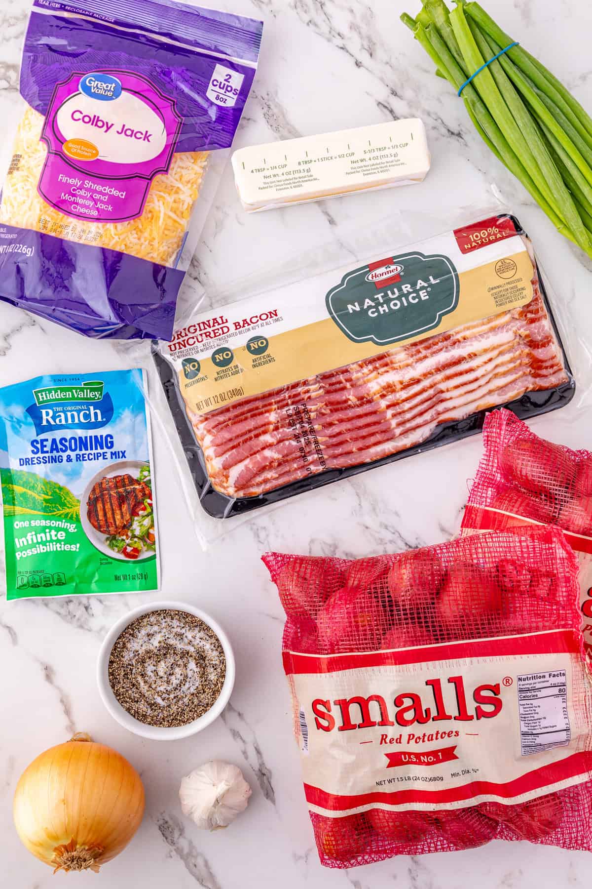 Overhead view of ingredients needed to make cheesy ranch potatoes