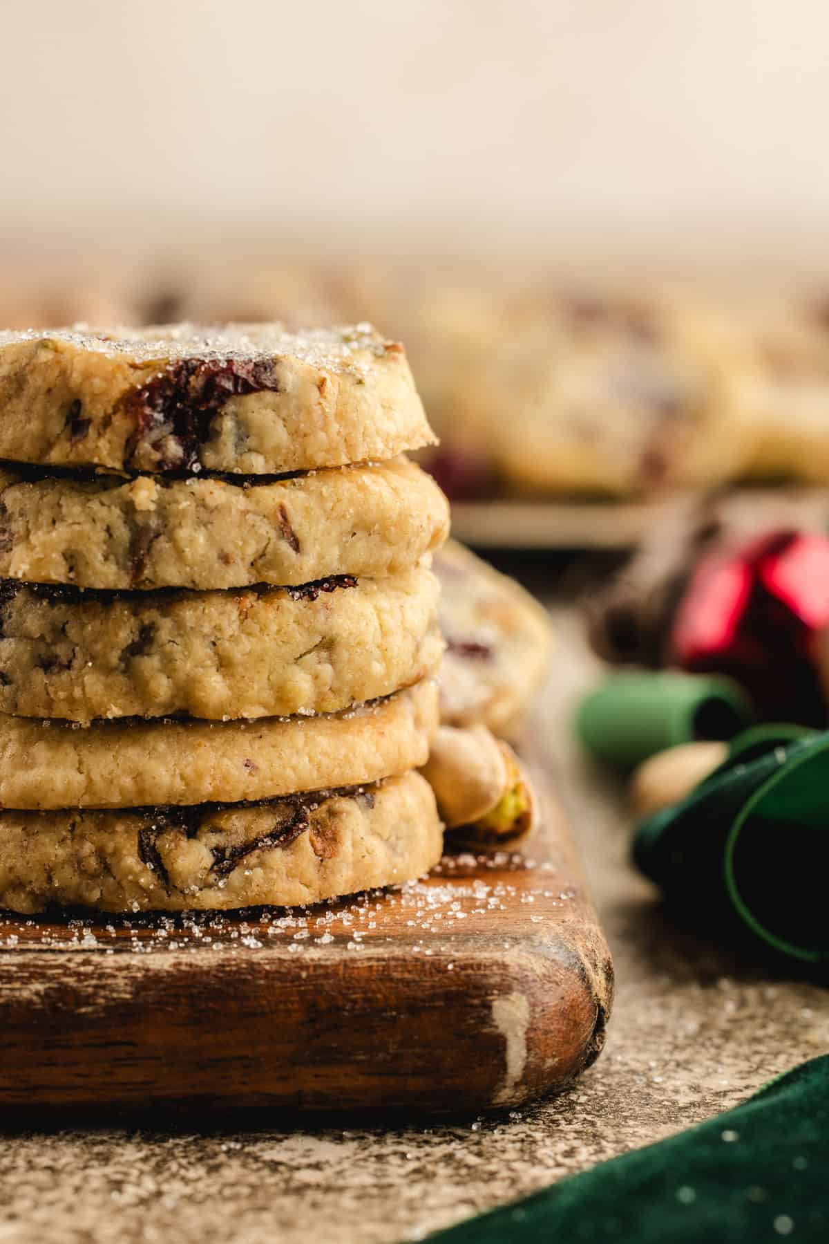 A stack of cranberry pistachio shortbread cookies