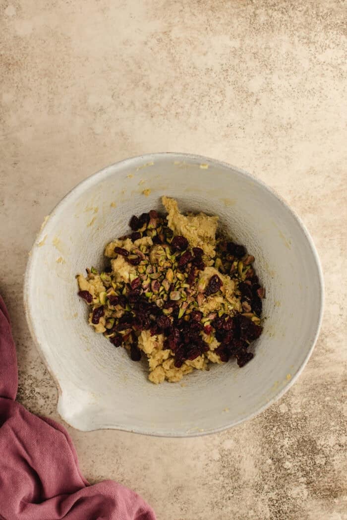 Cranberry pistachio dough in a bowl