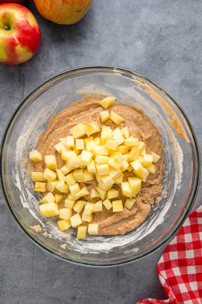 Each bite of these Applesauce Muffins is incredibly moist and infused with warm apple flavor. They look like something straight from a bakery! Adding diced apples to muffin batter