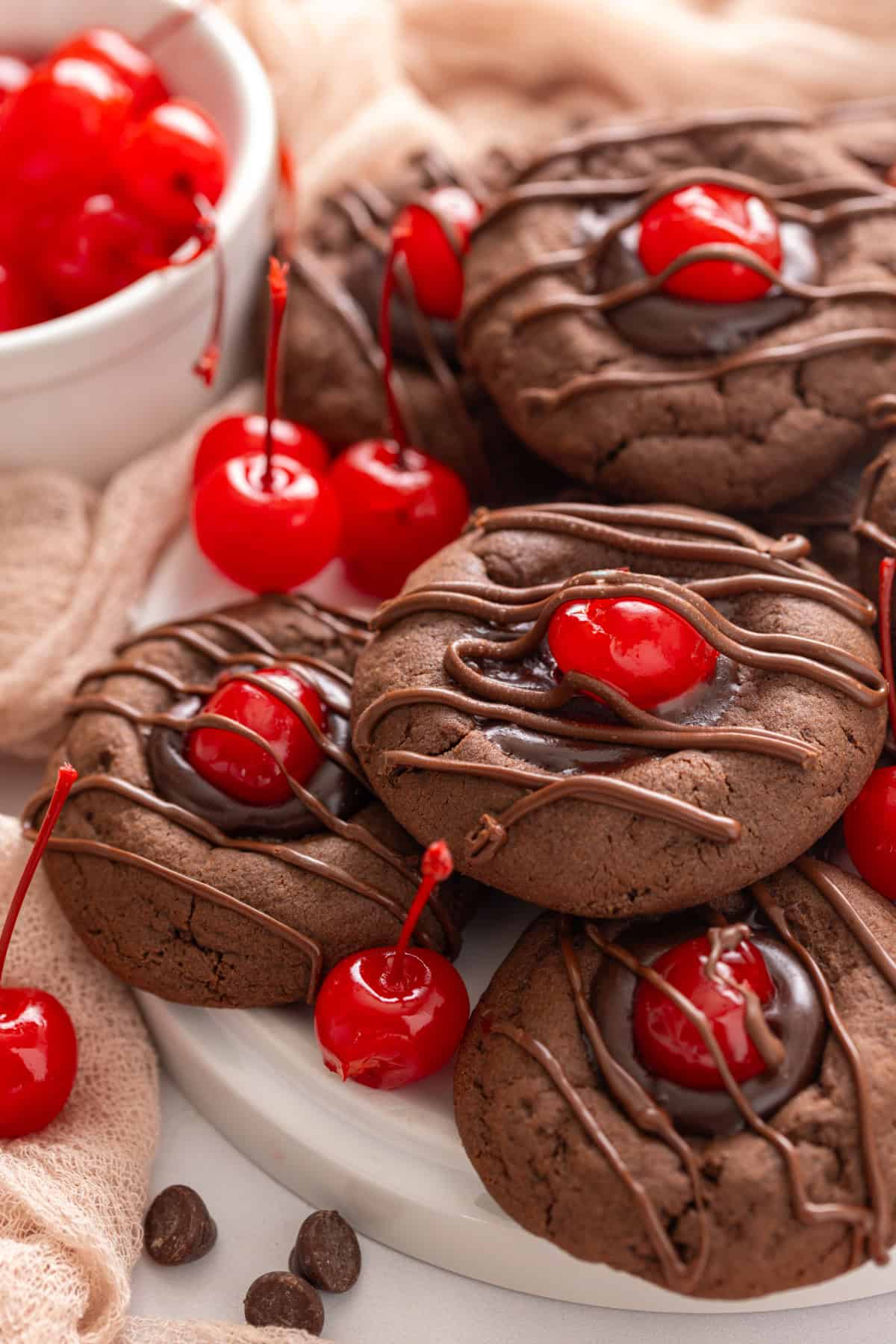 Chocolate Cherry Cookies stacked on a platter