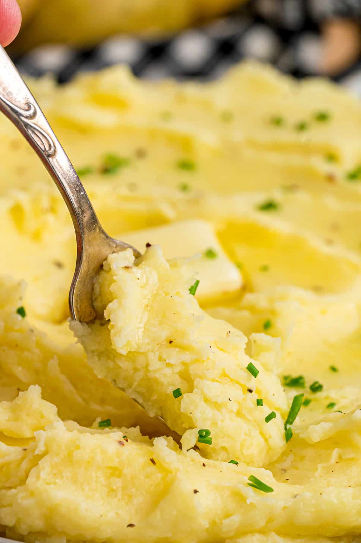 A fork in garlic mashed potatoes