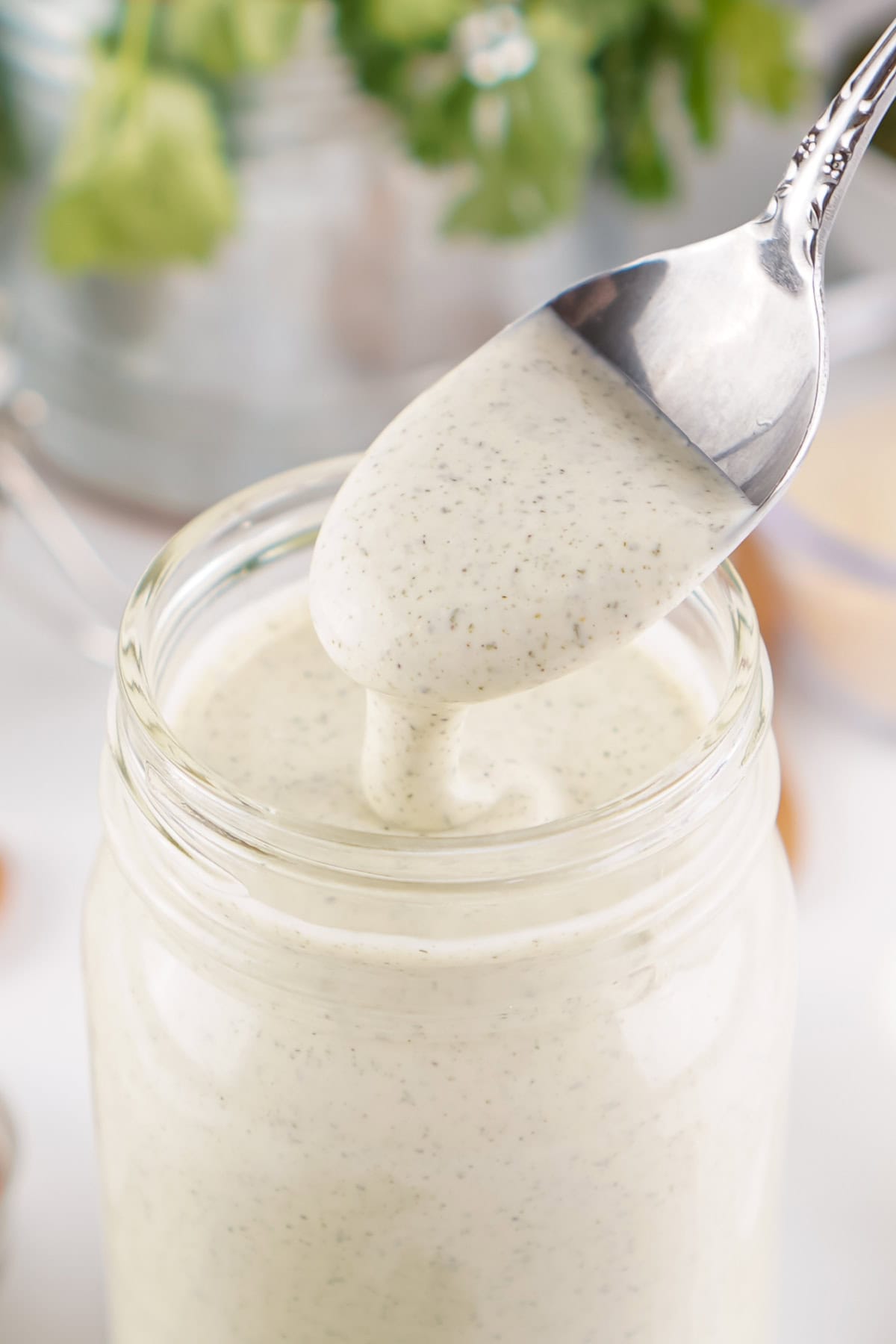 With just 6 simple spices, this Homemade Ranch Seasoning takes less than 5 minutes to prepare. A pantry staple! Homemade Ranch in a mason jar with a spoon