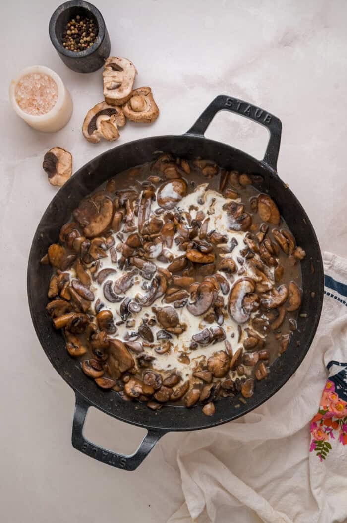 Ready in just 35 minutes, this Creamy Mushroom Pasta looks like a fancy restaurant dish but is easy enough to whip up on busy weeknights. Flour sprinkled on cooked mushrooms