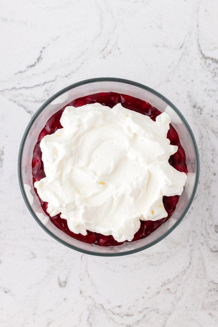 Rich devil’s food cake, cherry pie filling, and homemade whipped cream are layered to make this impressive yet easy Black Forest Trifle. Whipped cream on top of cherry pie filling
