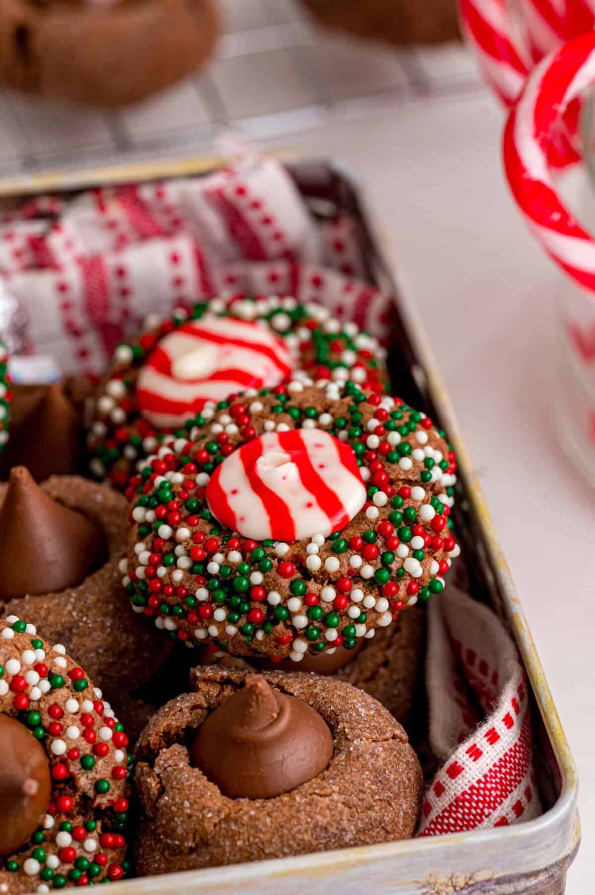 With chocolate kisses pressed in the center of chewy chocolate cookies, these Hershey Chocolate Kiss Cookies are made for chocolate lovers! A pan of Hershey kiss cookies