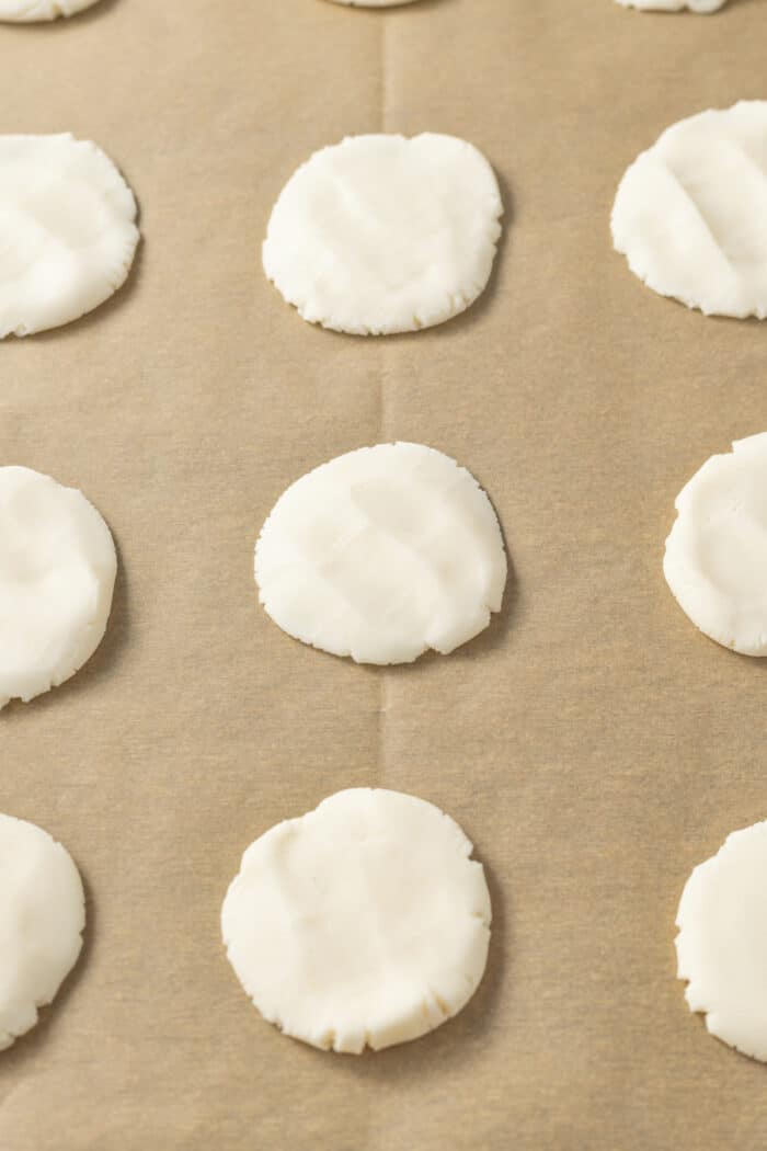 These classic Chocolate Covered Cherries are incredibly easy to make, and always a favorite for Christmas, Valentine's Day, or any time of year. flattened white candy mixture