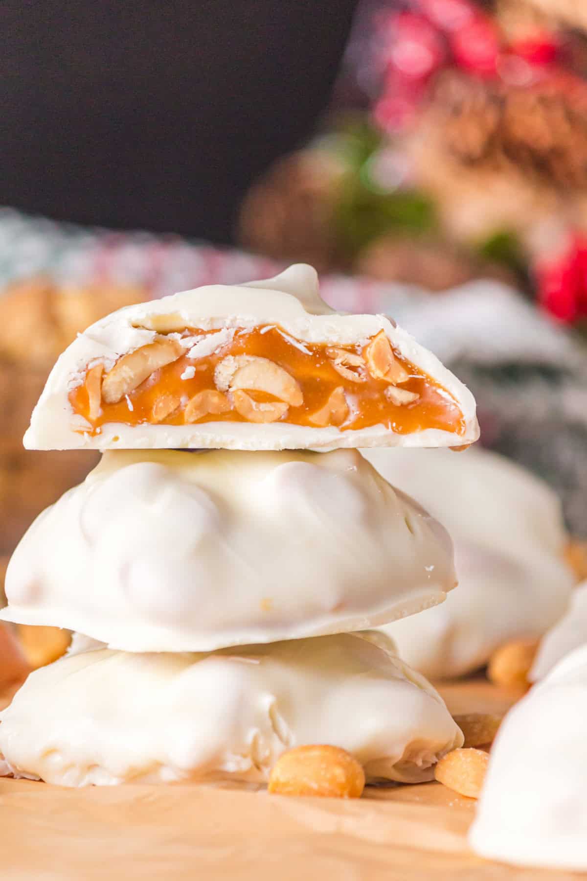 This Polar Bear Paws Candy recipe is a copycat version of See’s Candies that you can easily at home! stacked Polar Bear Paws Candy