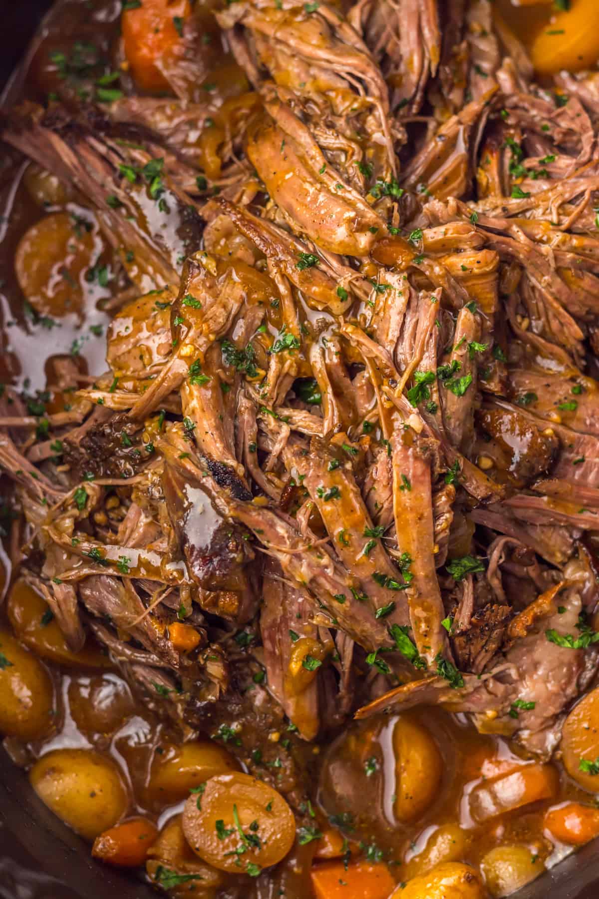 This Slow Cooker Coca Cola Pot Roast is the ultimate hearty, comforting dinner that practically makes itself. Coca Cola pot roast in the slow cooker