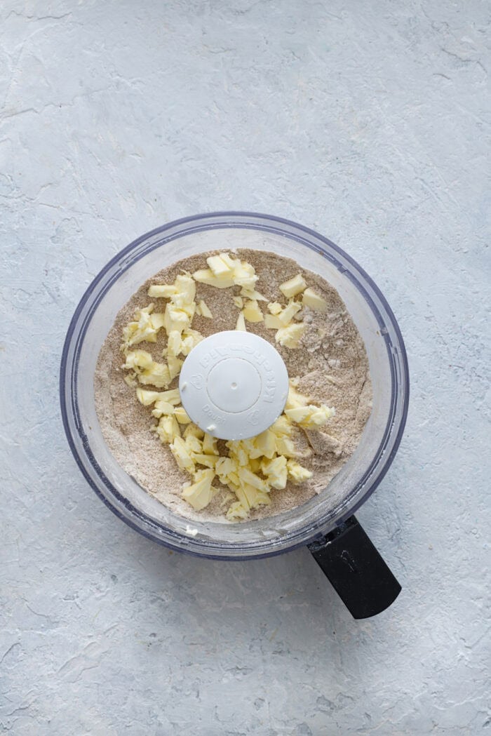 Cubes of butter added to a food processor