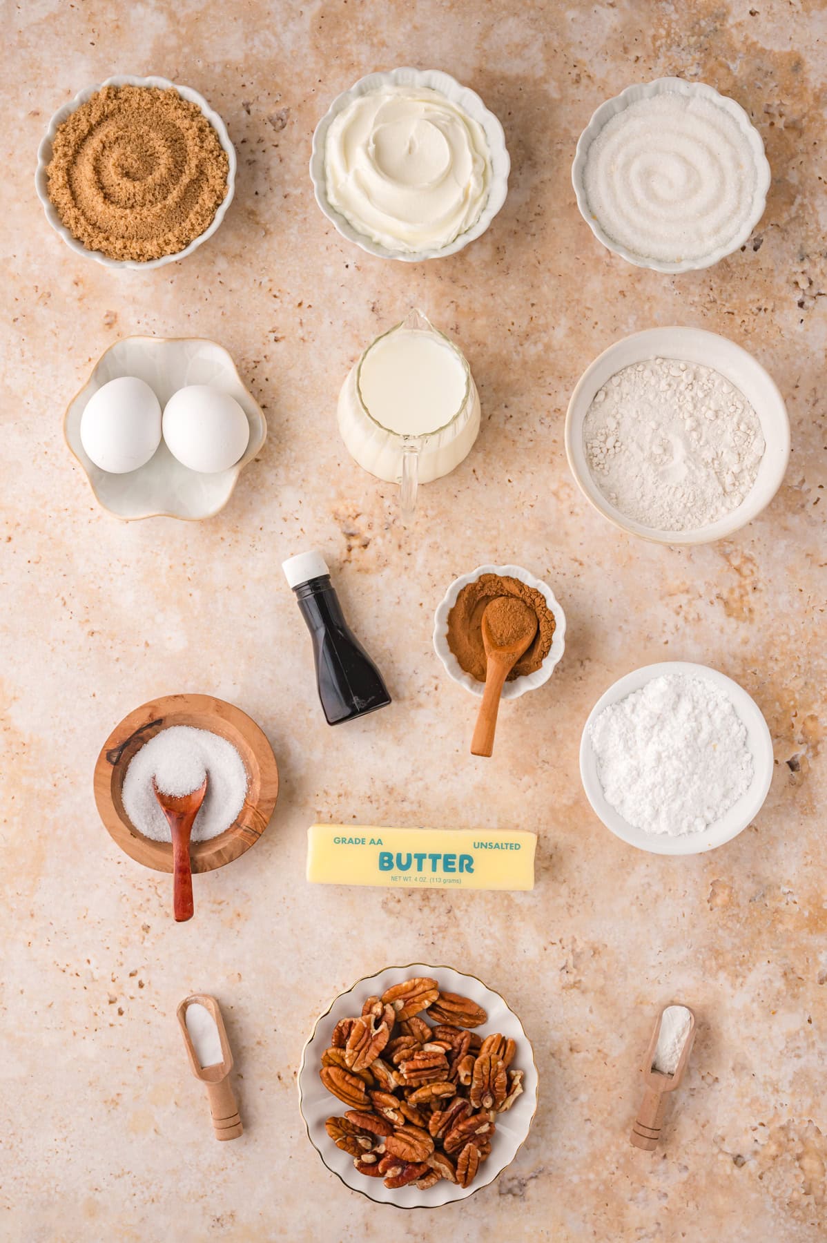 This Sour Cream Coffee Cake is soft and buttery with a generous cinnamon sugar ribbon baked through the middle & streusel topping. Overhead view of ingredients needed to make sour cream coffee cake