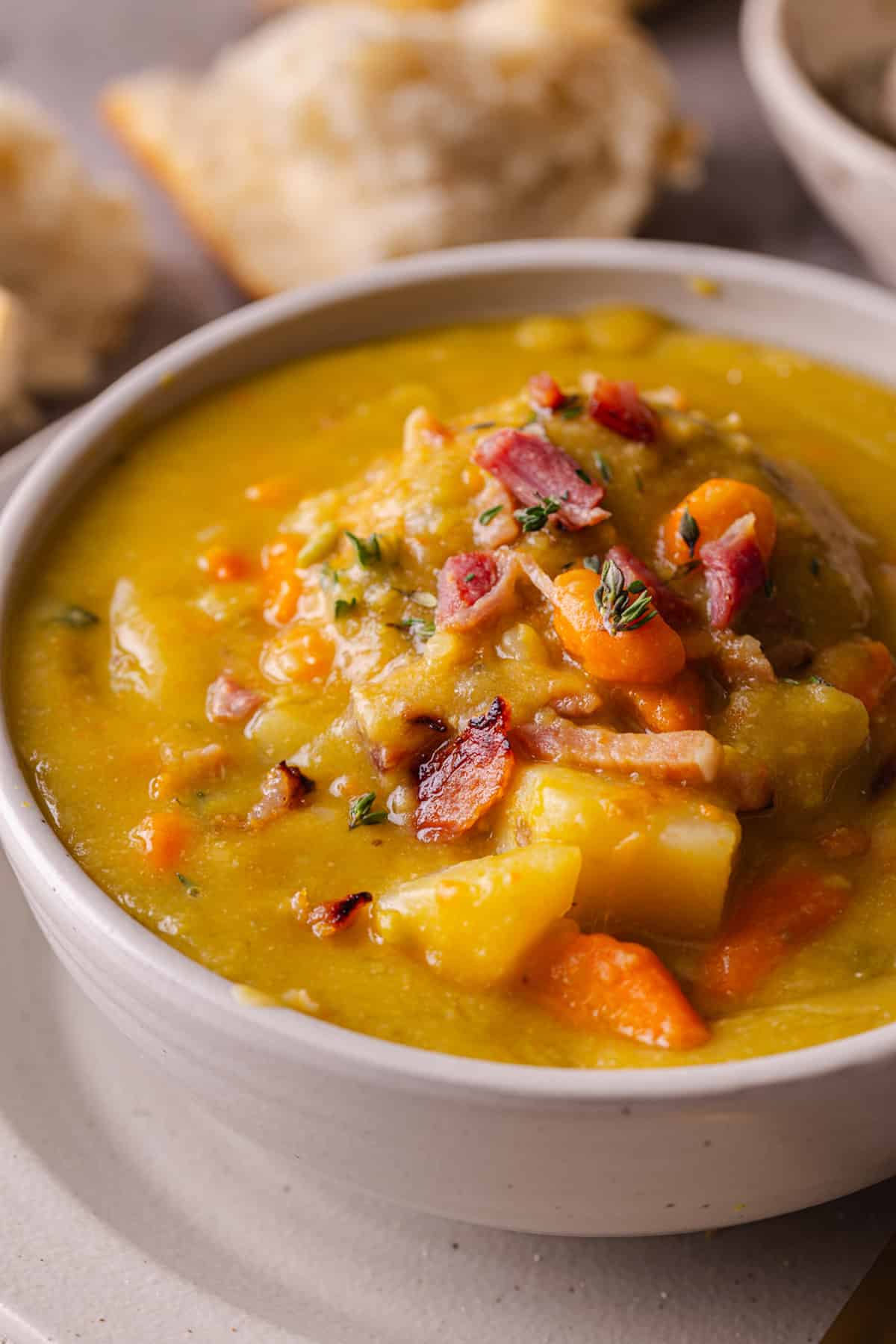 A bowl of slow cooker split pea soup with ham