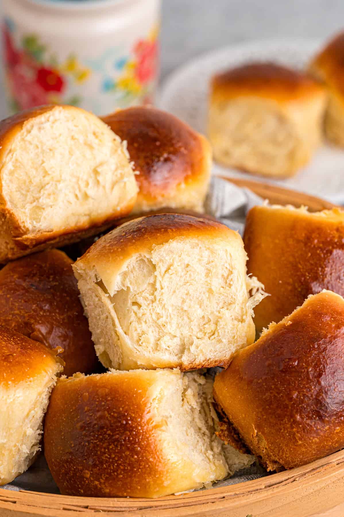 This Hawaiian Rolls recipe makes soft, fluffy rolls that taste just like the store-bought version – maybe even better. A basket of Hawaiian rolls