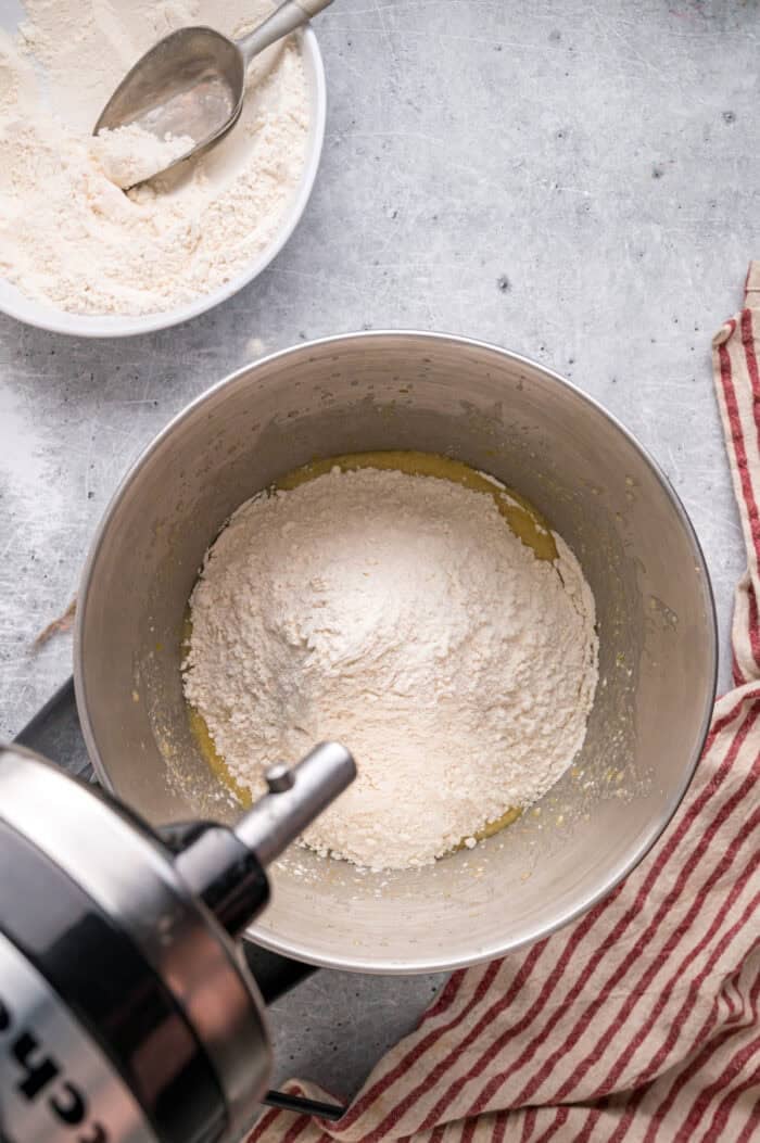 This Hawaiian Rolls recipe makes soft, fluffy rolls that taste just like the store-bought version – maybe even better. Adding flour to wet ingredients