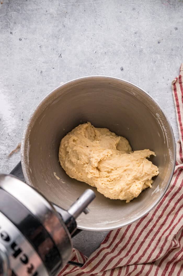 This Hawaiian Rolls recipe makes soft, fluffy rolls that taste just like the store-bought version – maybe even better. Mixing Hawaiian roll dough in a bowl