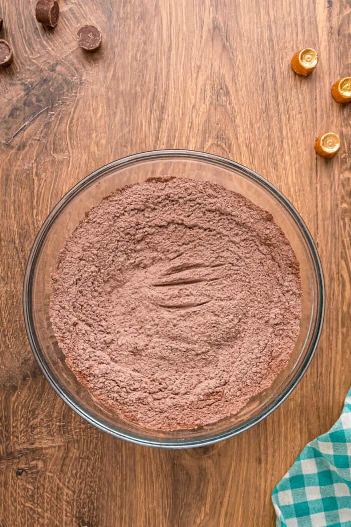 Dry chocolate cookie ingredients in a bowl