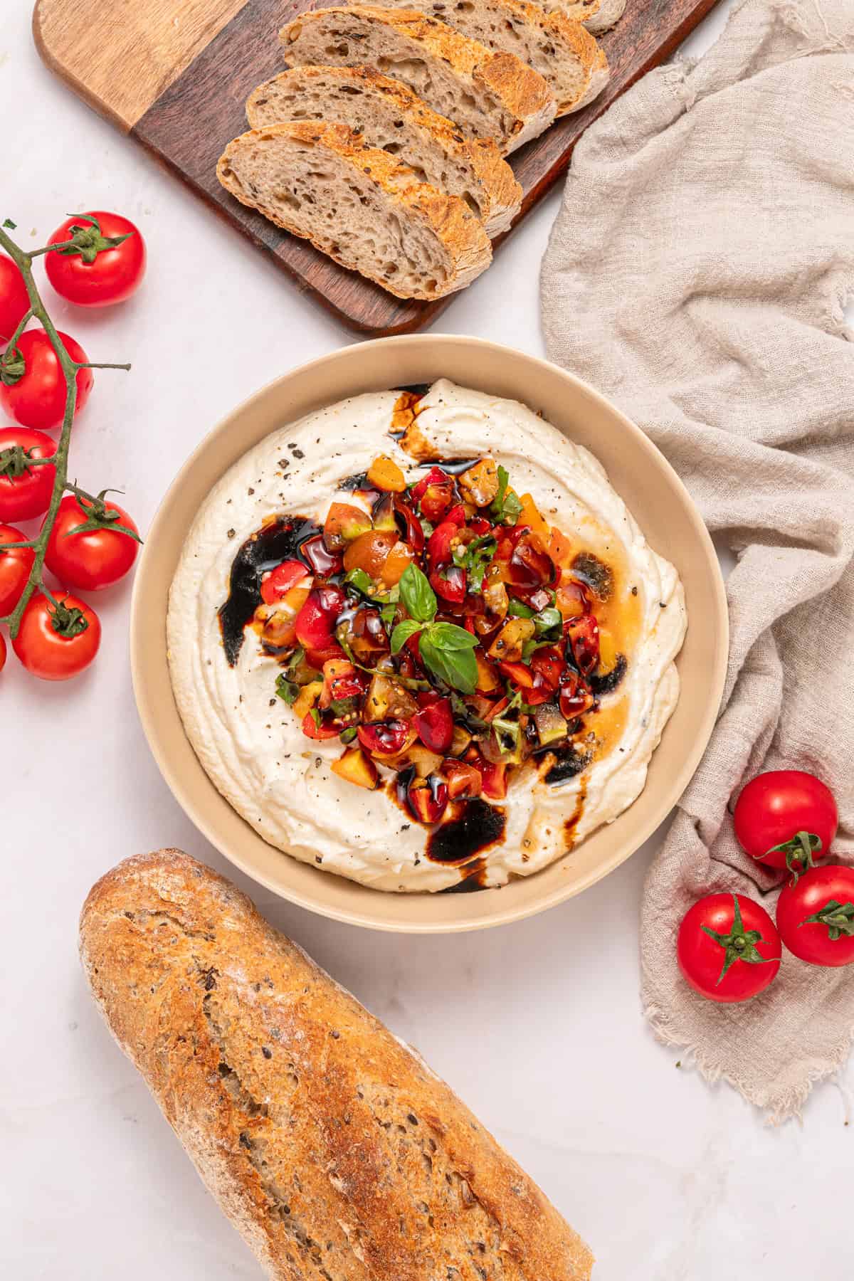 Overhead view of a bowl of bruschetta dip