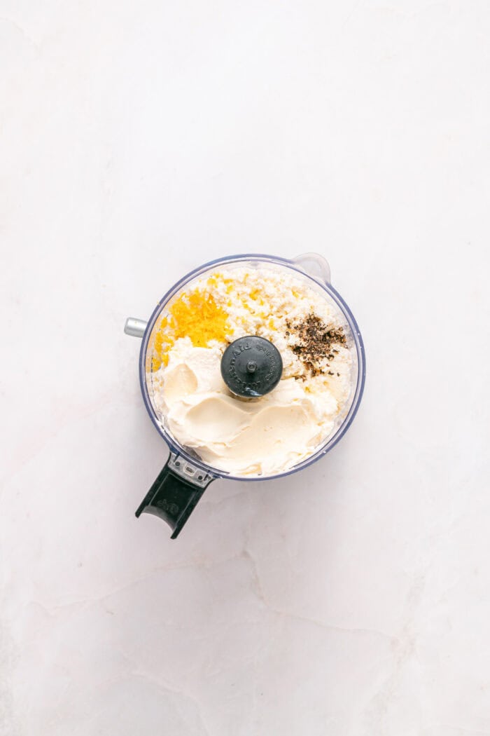 Ricotta, olive oil, salt and pepper in a food proessor