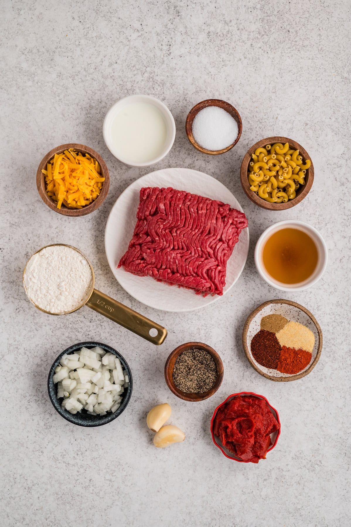 Overhead view of ingredients needed to make cheeseburger mac and cheese
