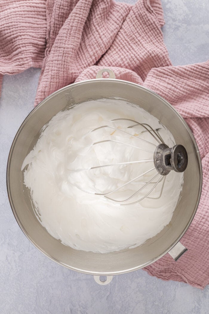 Light and fluffy just like a marshmallow, this Marshmallow Frosting recipe takes just 5 ingredients and 10 minutes to prepare. Marshmallow frosting in a bowl