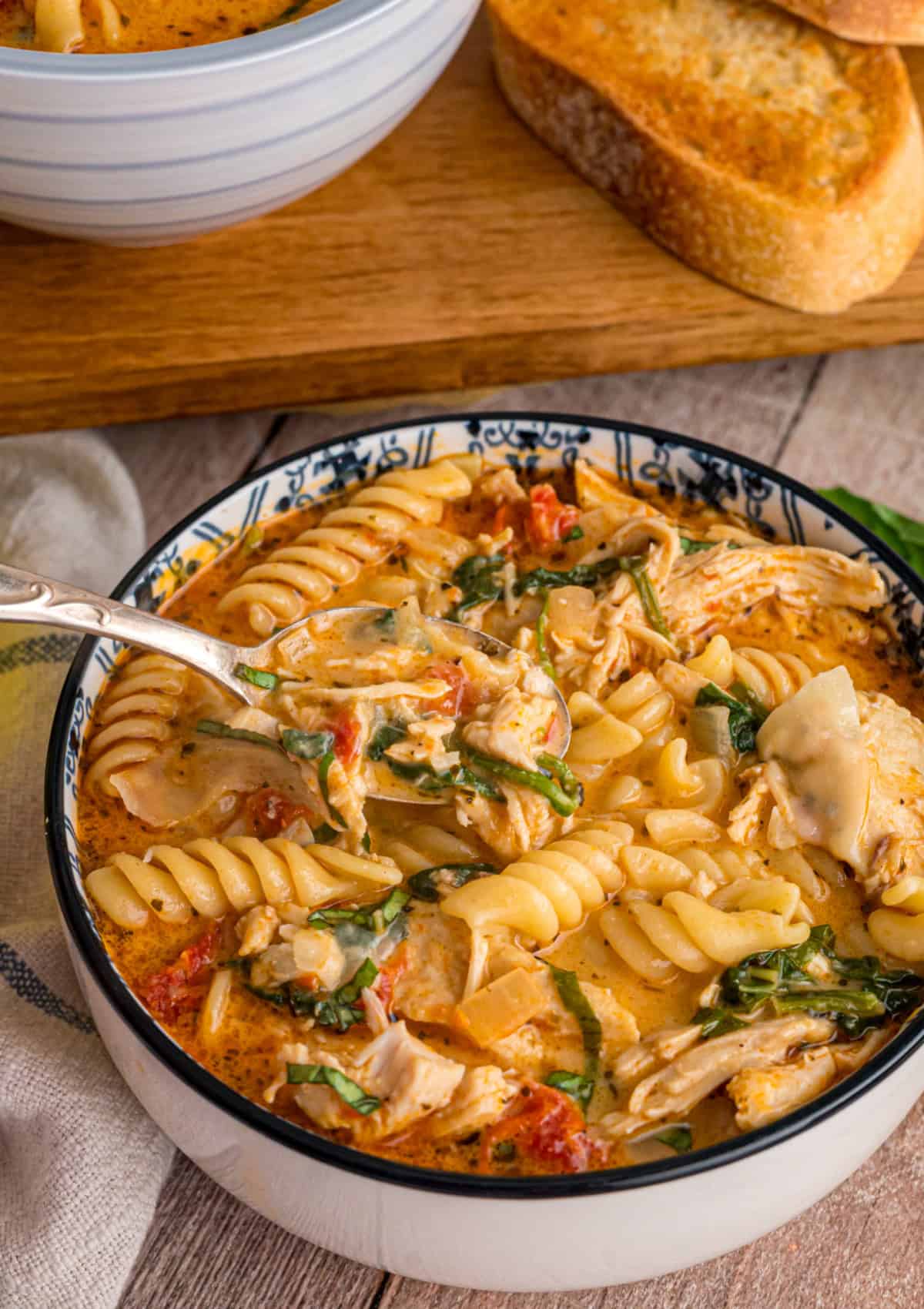 Marry Me Chicken Soup in a bowl with a spoon