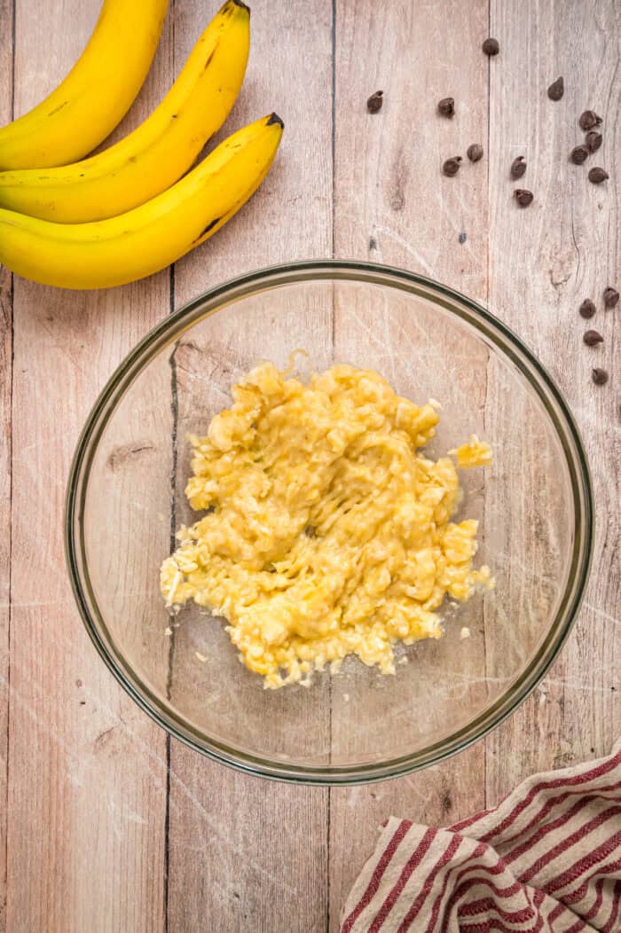 Made with just 3 ingredients in less than 25 minutes, these Banana Oatmeal Cookies are quick, easy, and so yummy. Mashed bananas in a bowl