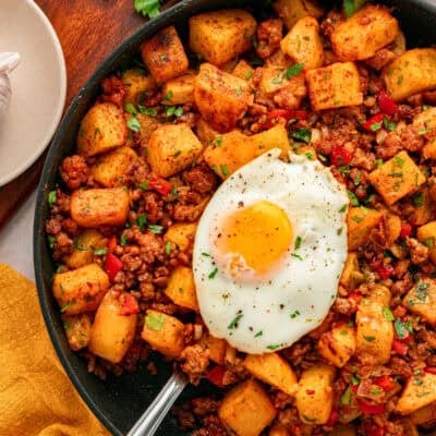 Overhead view of a skillet of chorizo and potatoes